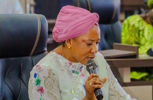Hon. Acharu Okpanachi, Kogi State Commissioner for Women Affairs and Social Development, speaking at an official event