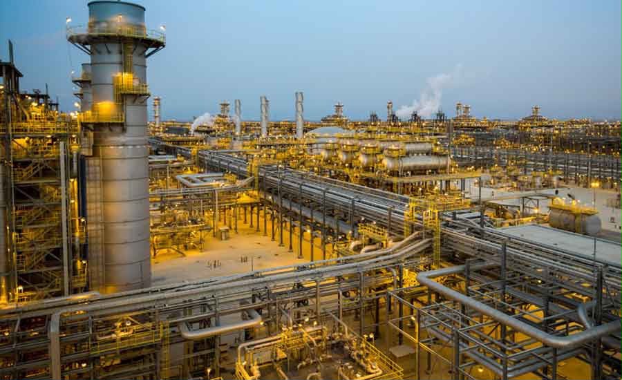 Oil and gas processing facility with pipelines and industrial equipment