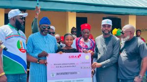 Umar Yahaya and Wemi Jones at the Omala education scheme flag-off ceremony in Kogi State.